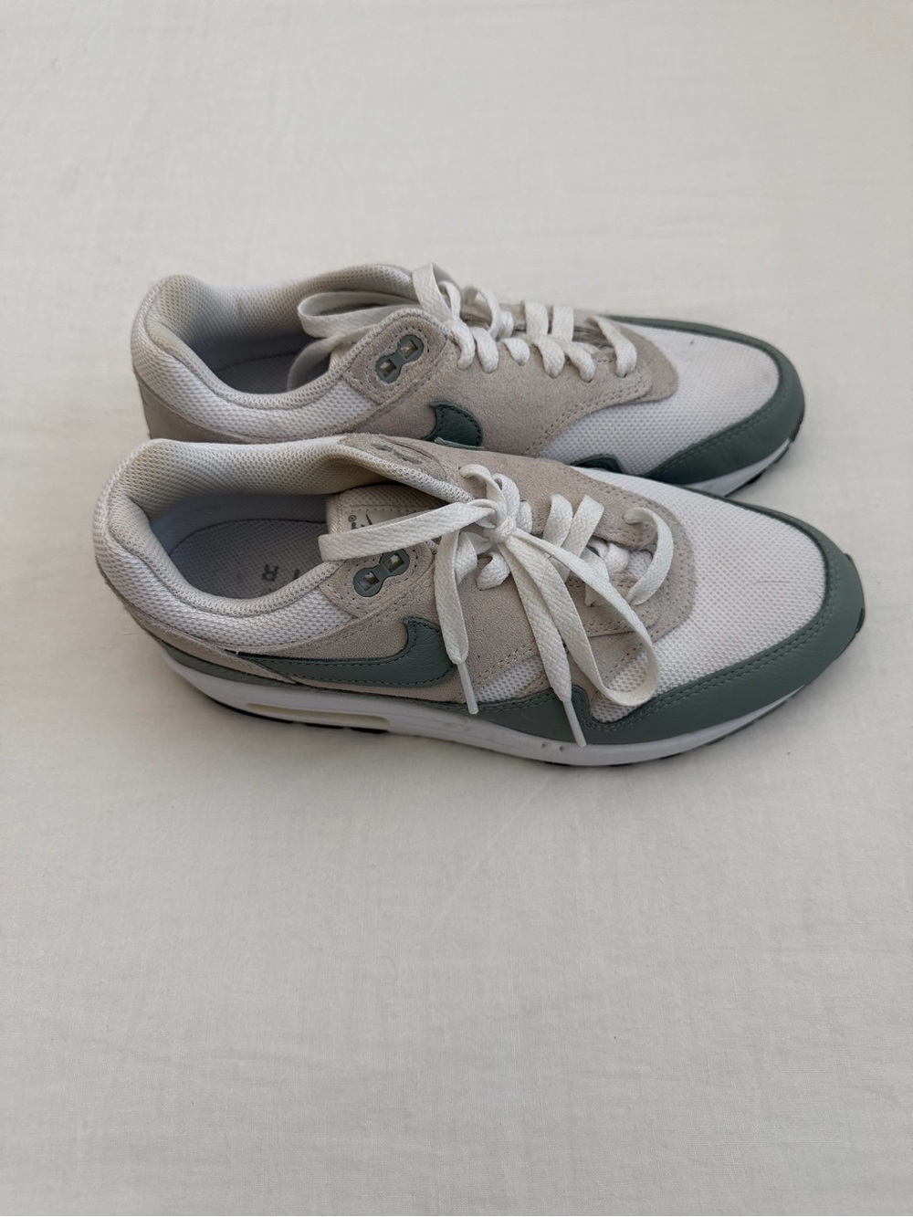 Nike White Low-Top Air Max Sneakers with Subtle Sage Green Logo